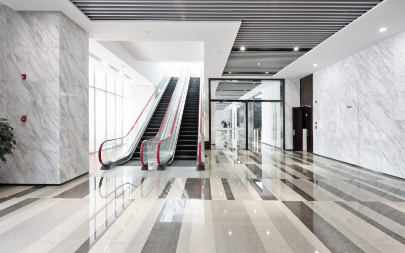 Interior,Of,Center,With,Escalator,In,Modern,Office,Building